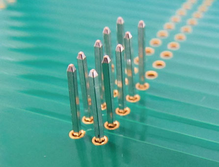 Press-fit pins (enabling solder usage reduction)